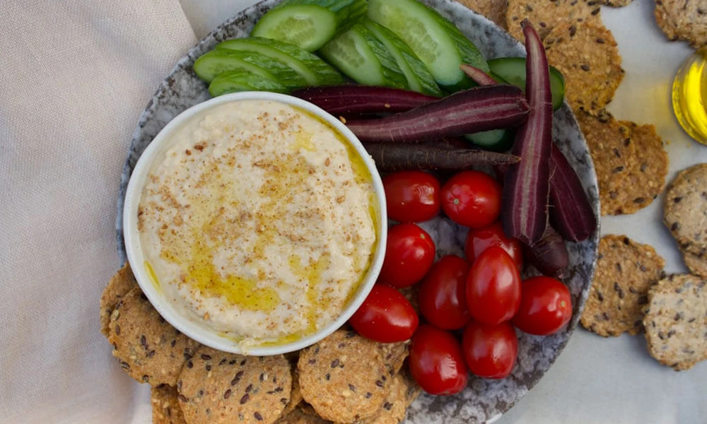 Caramelised Onion Ful Nabed with Smoked Quinoa Crackers