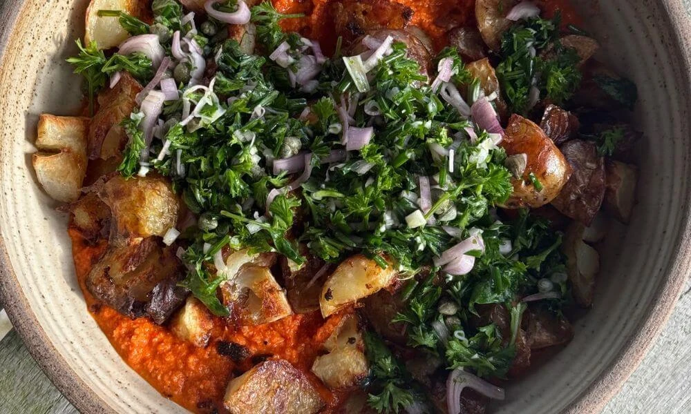 Crispy Smashed New Potatoes on Romesco Sauce