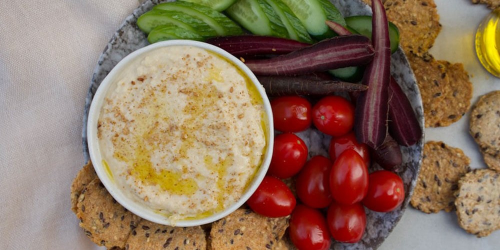 Caramelised Onion Ful Nabed with Smoked Quinoa Crackers